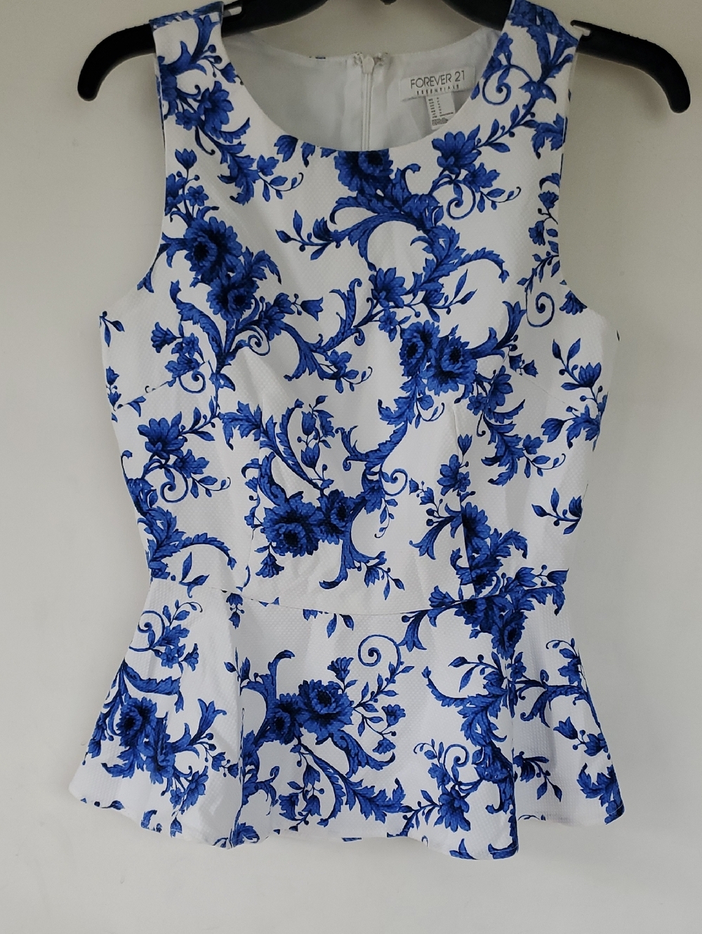 Forever 21 White Sleeveless Peplum Top with Blue Floral Print